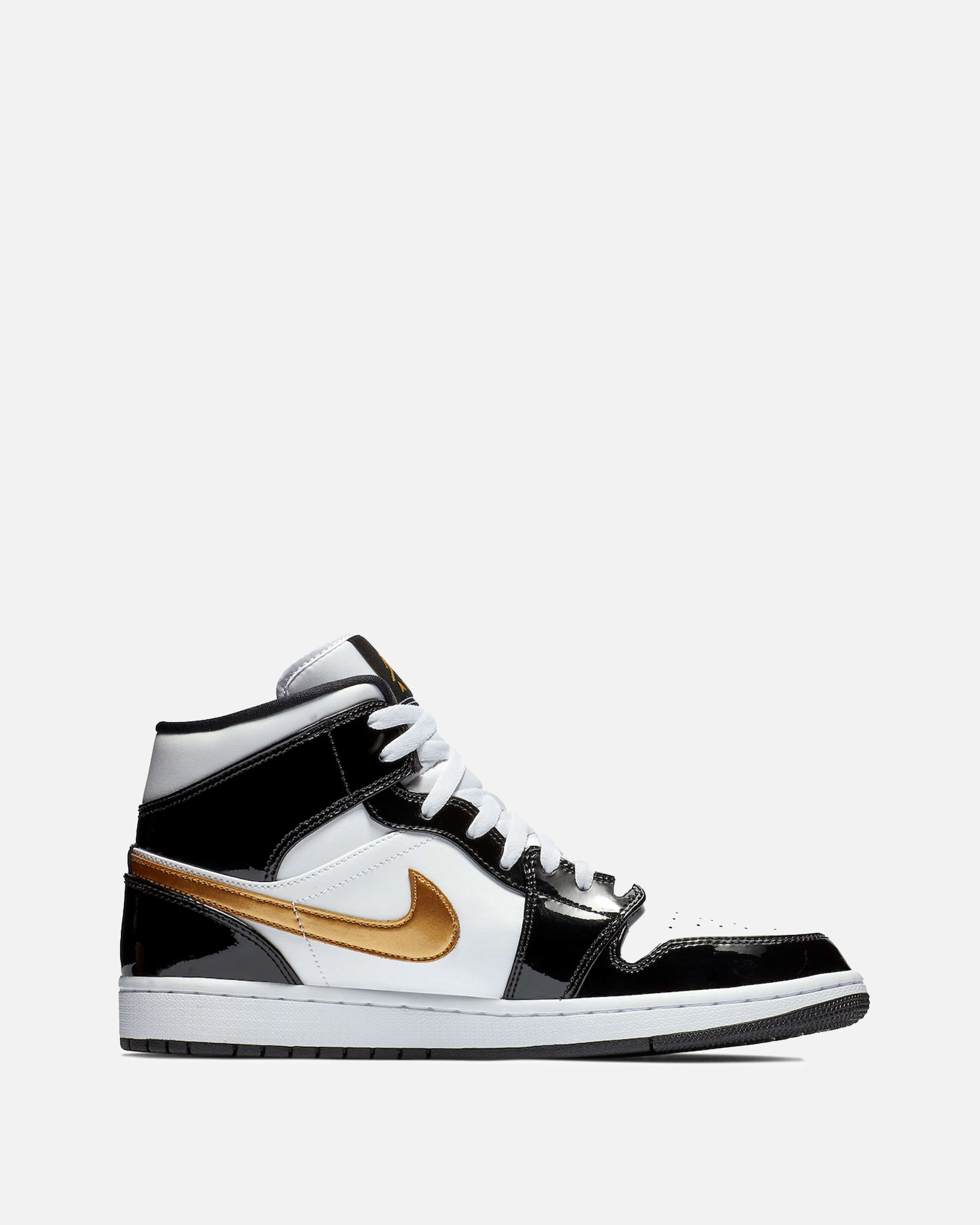 Jordan mid black gold best sale