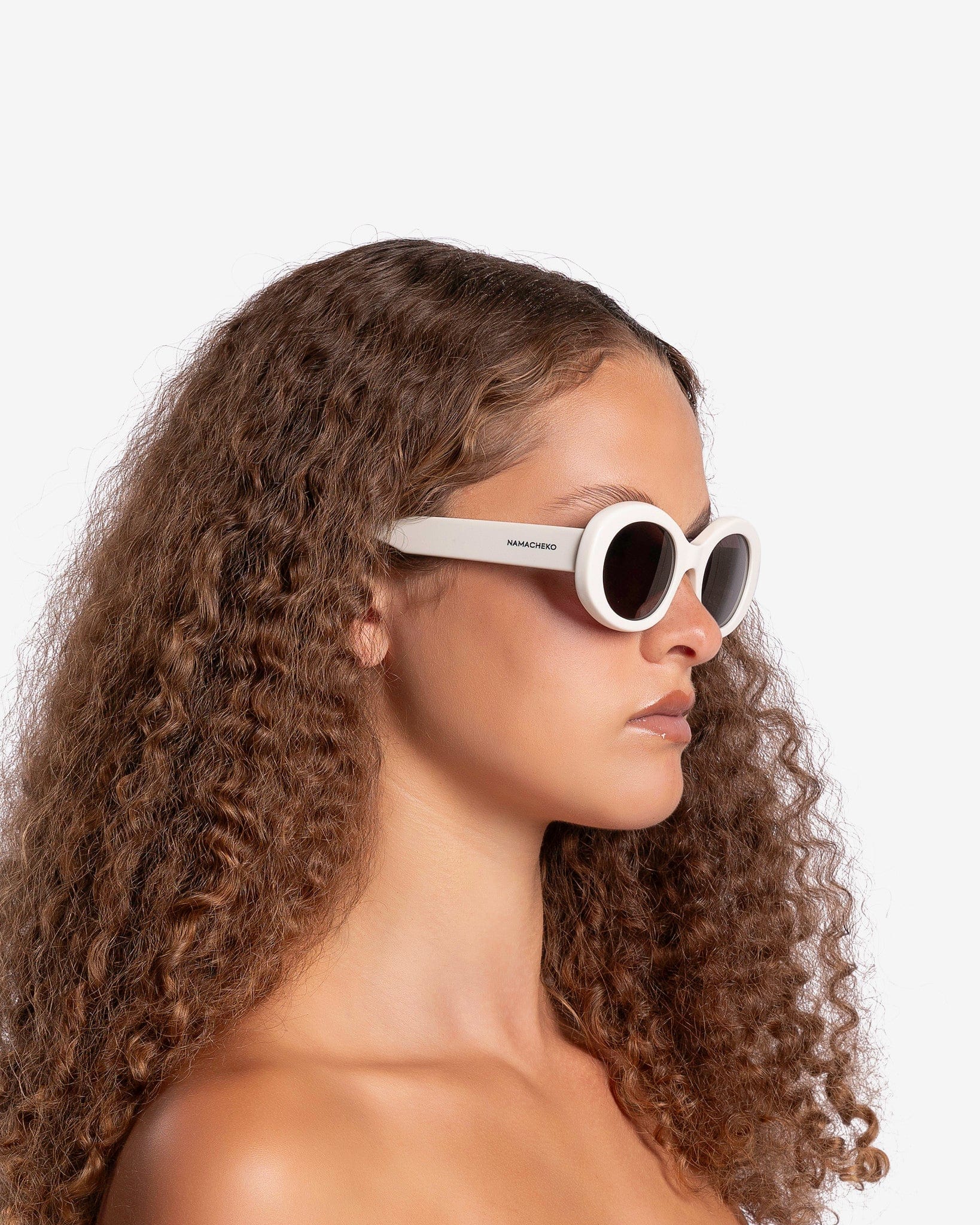 NAMACHEKO Eyewear O/S Keser Sunglasses in White/Nero