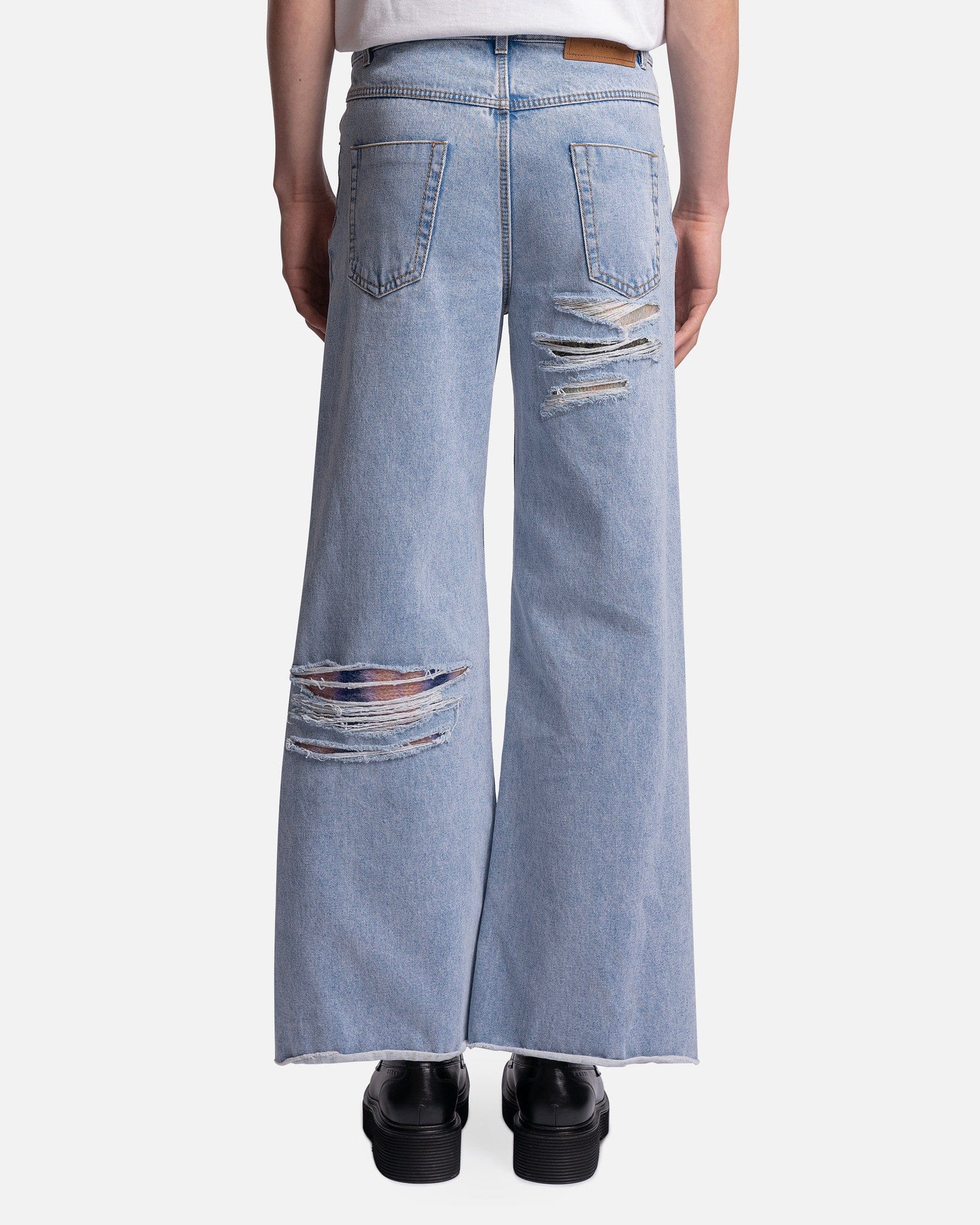 Flared Bleach Coated Trousers in Illusion Blue